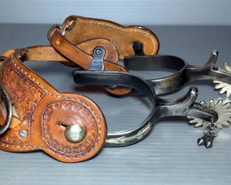 Spurs With Tooled Leather Spur Straps, Qty 2, Swing Arm Is Marked Colorado, Heelband Has Arrow Decoration 
