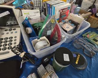 Captel hearing impaired telephone, new tapes (vhs, cassette, camcorder, etc.), Koch paperweight, turquoise 3 tier cart on wheels, readers, flashlight, misc. office supplies
