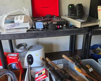 Turntable record players, wii system and game, handheld tools, speakers, microphone, tv, horseshoes, computer mouse