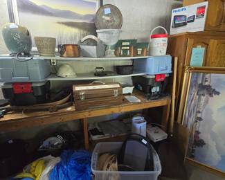 Water fountain, military drop parachute, tool box, railroad birdhouse, tins, copper pot with iron handles, Philips van TVs, humidifier, safety kit, planter, saw, kitchen cabinets, pantry