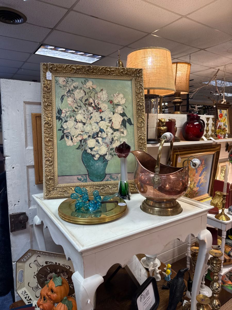 Beautiful floral oil painting, brass charger plates, antique coal scuttle, Jack in the Pulpit Calla Lilly Blown Glass vase, white side table