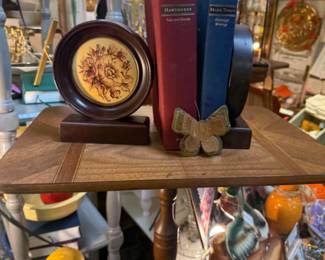 Vintage floral bookends, brass and copper butterly, vintage books, small plant stand