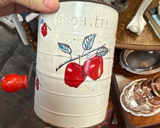 Vintage sifter with apple motif