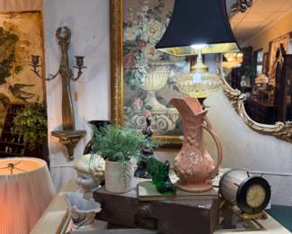 pitcher, wall sconce, mirror, floral art