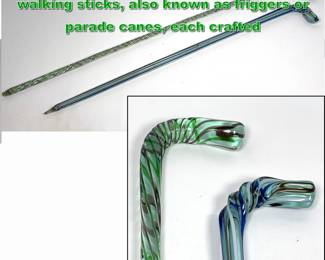 Lot 1900 Pair of Victorian Nailsea glass walking sticks, also known as friggers or parade canes, each crafted