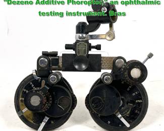 Lot 2328 Vintage American Optical Company Dezeno Additive Phoroptor, an ophthalmic testing instrument. Bras