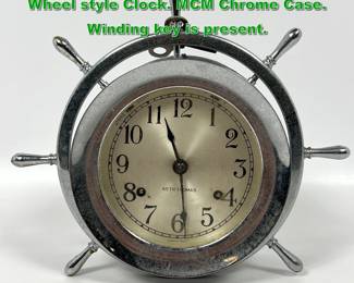 Lot 2215 SETH THOMAS Helmsman Ships Wheel style Clock. MCM Chrome Case. Winding key is present. 