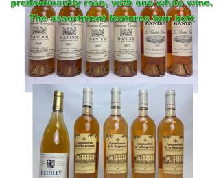 Lot 2392 11pc French wine bottles, predominantly rose, with one white wine. The assortment features four bott