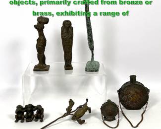 Lot 2219 Lot group of 7 diverse Metal objects, primarily crafted from bronze or brass, exhibiting a range of 