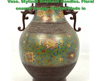 Lot 2024 Japanese Cloisonne Two Handled Vase. Stylized Elephant Handles. Floral enamel design. Marked Made in