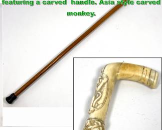Lot 1886 19th Century walking stick cane featuring a carved handle. Asia style carved monkey. 