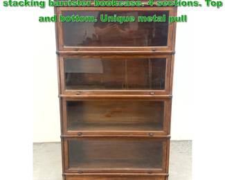Lot 1859 Globe Wernicke system Oak stacking barrister bookcase. 4 sections. Top and bottom. Unique metal pull