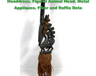 Lot 2048 Carved Wood Chi Wara Antelope Headdress. Figural Animal Head. Metal Appliques. Fiber and Raffia Deta