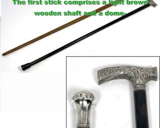 Lot 1906 2pcs Antique walking sticks Canes. The first stick comprises a light brown wooden shaft and a dome