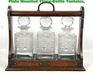 Lot 1977 Antique English Oak and Silver Plate Mounted ThreeBottle Tantalus,