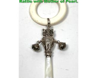 Lot 2166 Sterling silver Owl Form Baby Rattle with Mother of Pearl. 