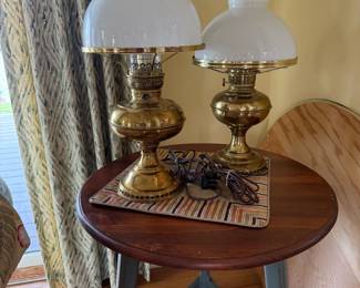 Brass lamps and side table