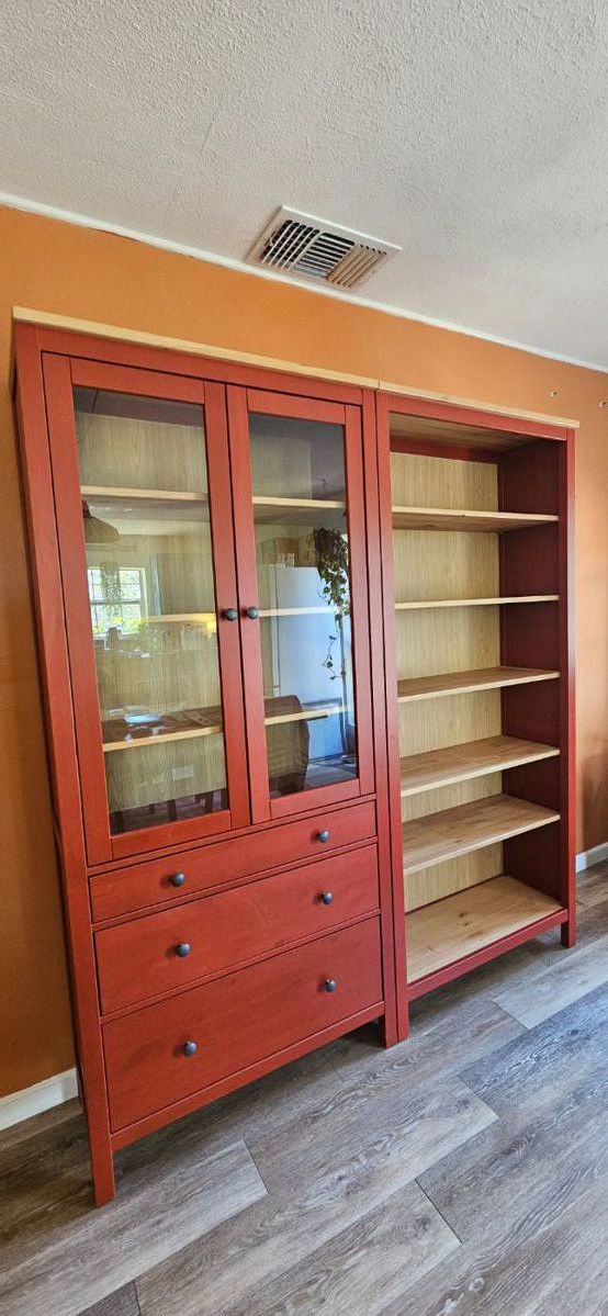 IKEA wooden kitchen cabinets 1 glass cabinet and 1 bookcase / Sold separately .
