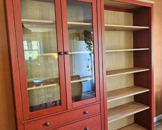 IKEA wooden kitchen cabinets 1 glass cabinet and 1 bookcase / Sold separately .