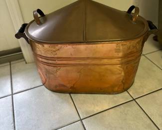 Several copper boilers