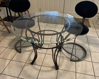 Glass top table with 2 chairs. Bar height