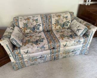 Upholstered loveseat.....