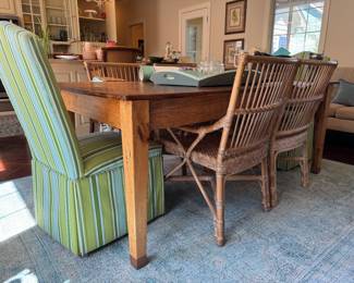 Handmade table. 2 green slipcovered chairs and 4 others sold separately 
