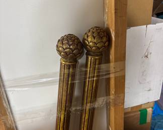 Ornate wooden curtain rods with brackets 