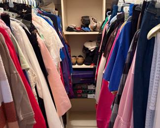 Packed closet filled with vintage clothing 