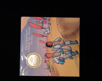 Sterling coins and book on reading