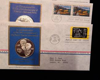Three more of the first day issue coins.