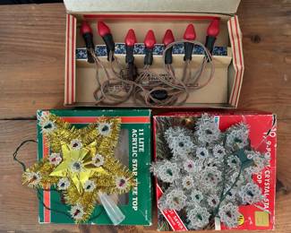 Vintage tree toppers and lights. 