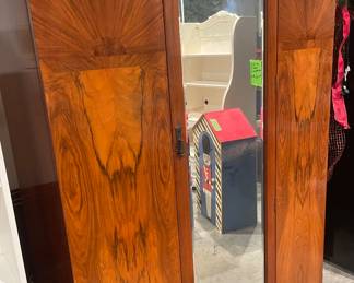Large antique wardrobe with mirror.
