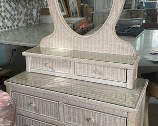 Vintage wicker dresser with oval mirror