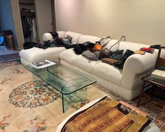 Coach, bags, hats, scarfs, table linens, suits chairs, table runners