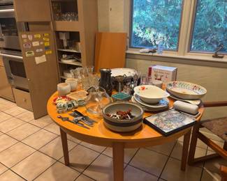 Kitchen table, lots of serving pieces