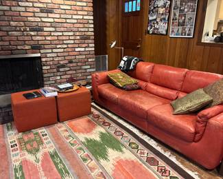 Leather couch, decorative pillows