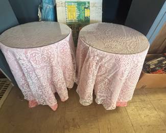Two round tables with glass tops
