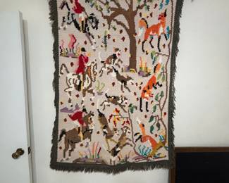 vintage hand-crafted textile depicting an English hunting scene.