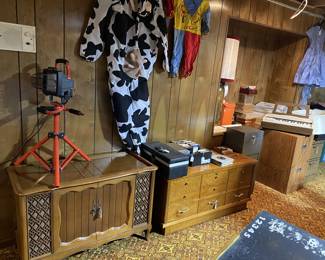 MCM MAGNAVOX FLOOR RADIO/RECORD PLAYER CONSOLE. WORKS!
Full size cedar chest
Metal file cabinets
Halloween costumes including Royal crown liquor costume with crown