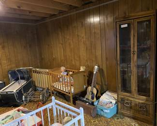 Vintage fifties baby stroller/bouncy cradle combo. Baby and doll beds.
Guitars , LP records. Gun cabinet