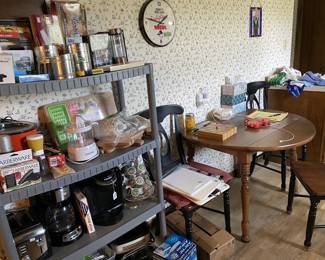 Oak drop leaf table w/ 4 matching chairs. Very sturdy.
Small appliances
Rolling kitchen cabinet storsge