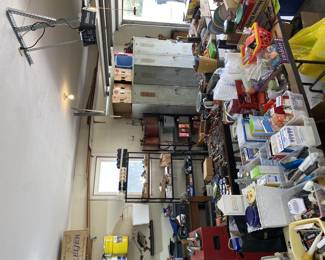Garage full of tools. Fishing Tackle. Tool boxes. Nails. Gas cans.
tables full of misc boxes for 1.00 a box