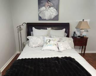 Queen size bed with Mink throw