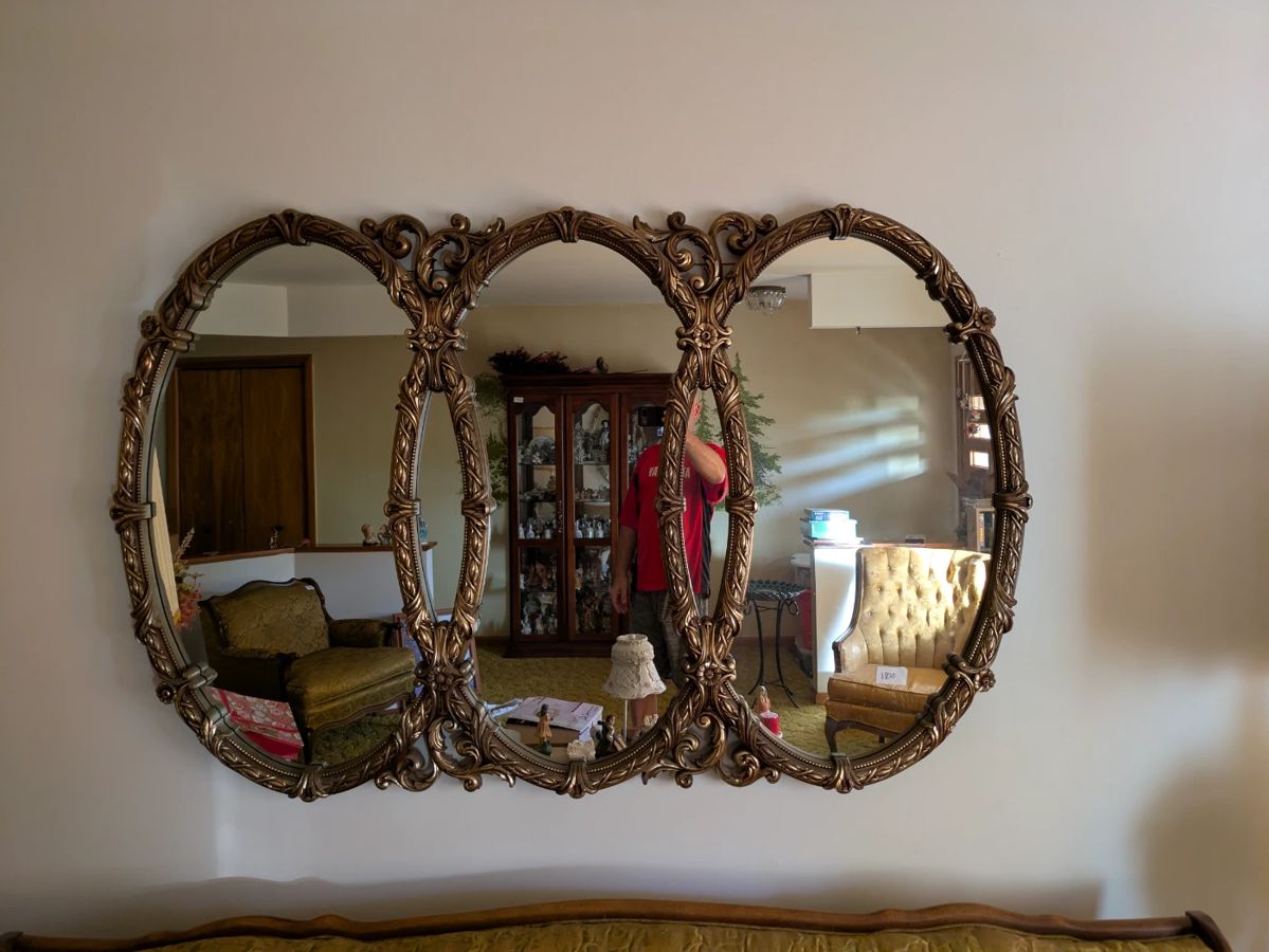 Vintage Mid Century Hollywood Rococo Triple Ring Gilded
Wood Mirror
