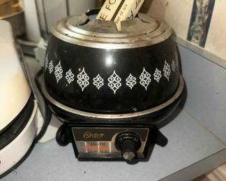 Vintage fondue pot with forks