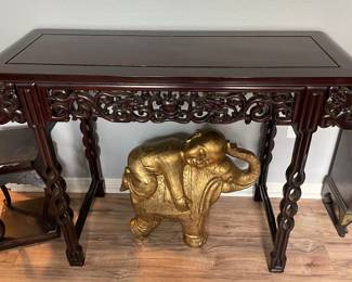 The Gold Elephant with the Lil Boy is not Available it's just in the picture in our clients home.