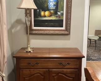 Thomasville buffet. Top folds out for extra space for serving food, bar. Drawer is felt lined for cutlery. $275