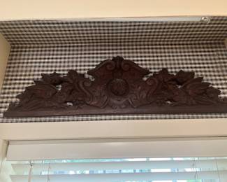Carved wood pediment