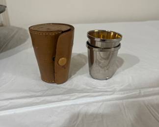 2 metal shot glasses with leather carrying case